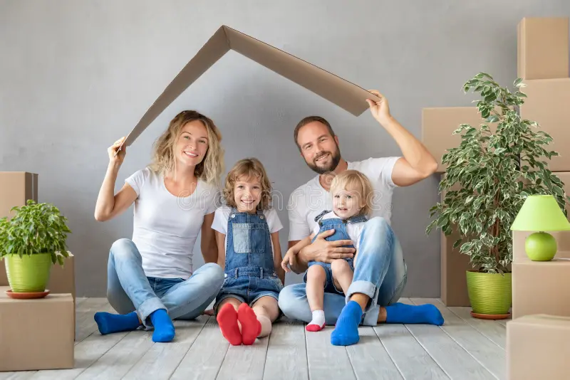 service-1 family new home moving day house concept happy family two kids playing new home father mother children having fun 137647257